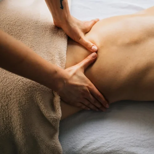 Experience relaxation with a soothing massage in a comfortable indoor setting, perfect for self-care and stress relief.